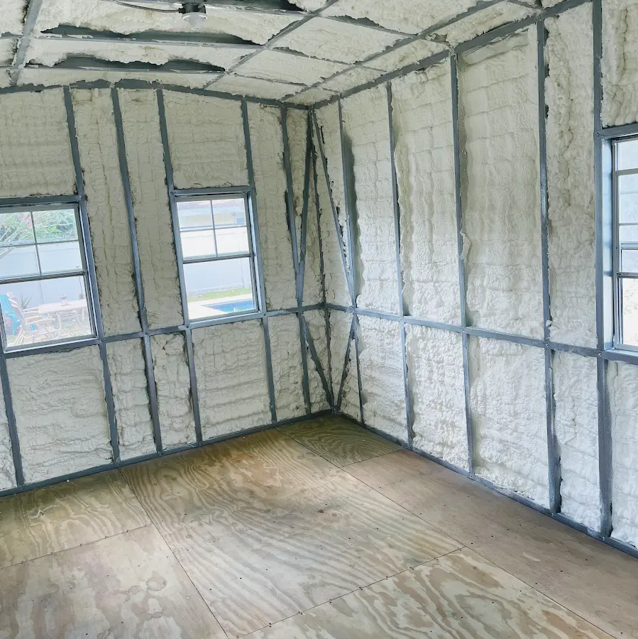Closed-cell spray foam insulation applied to wall cavities in a residential project in Emmett